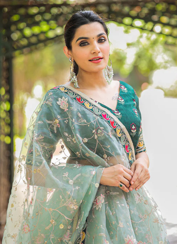 Pista Green Embroidered Lace Border Organza Lehenga Choli